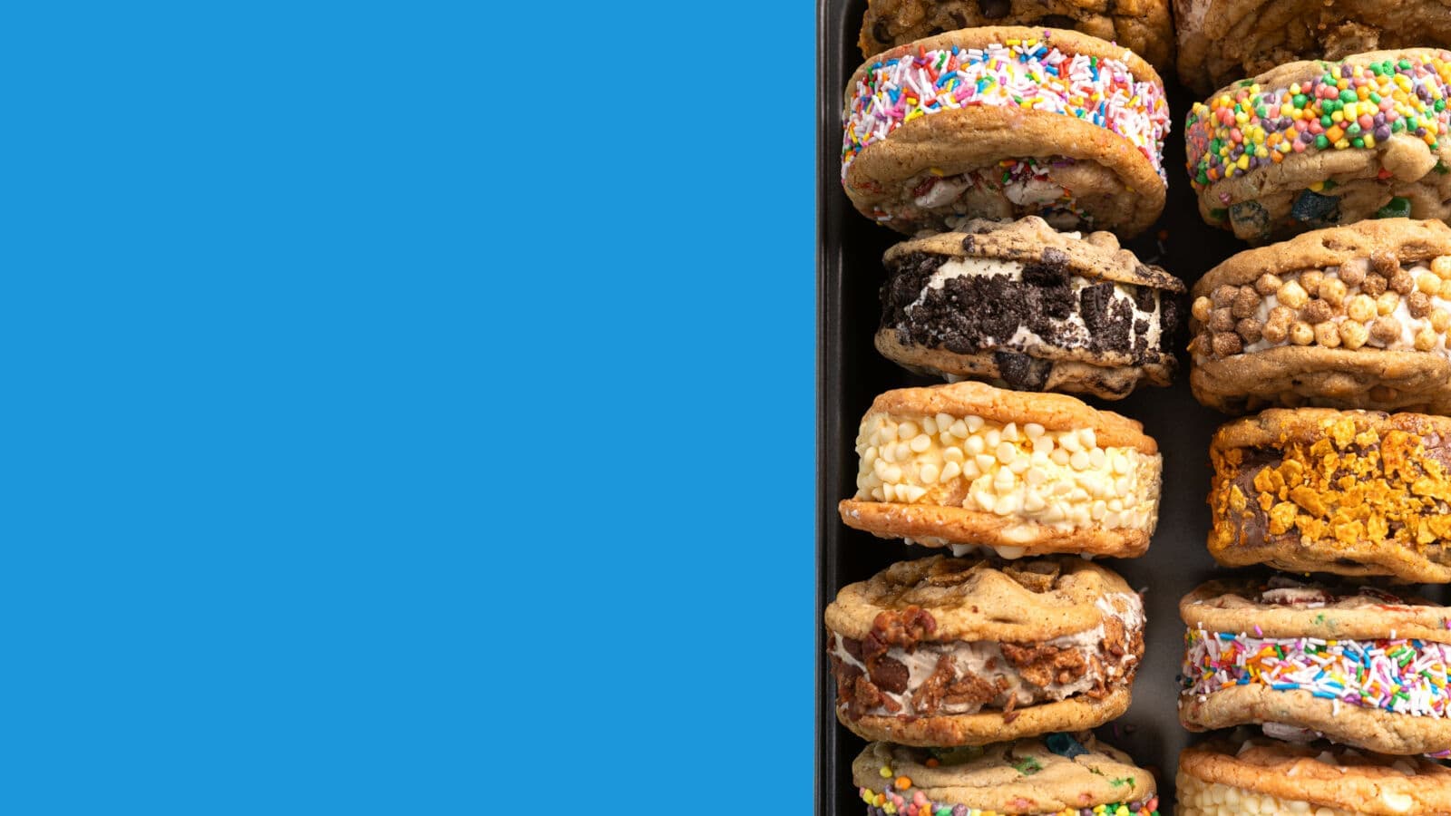 A variety of Smooshies ice cream sandwiches stacked on top of each other.